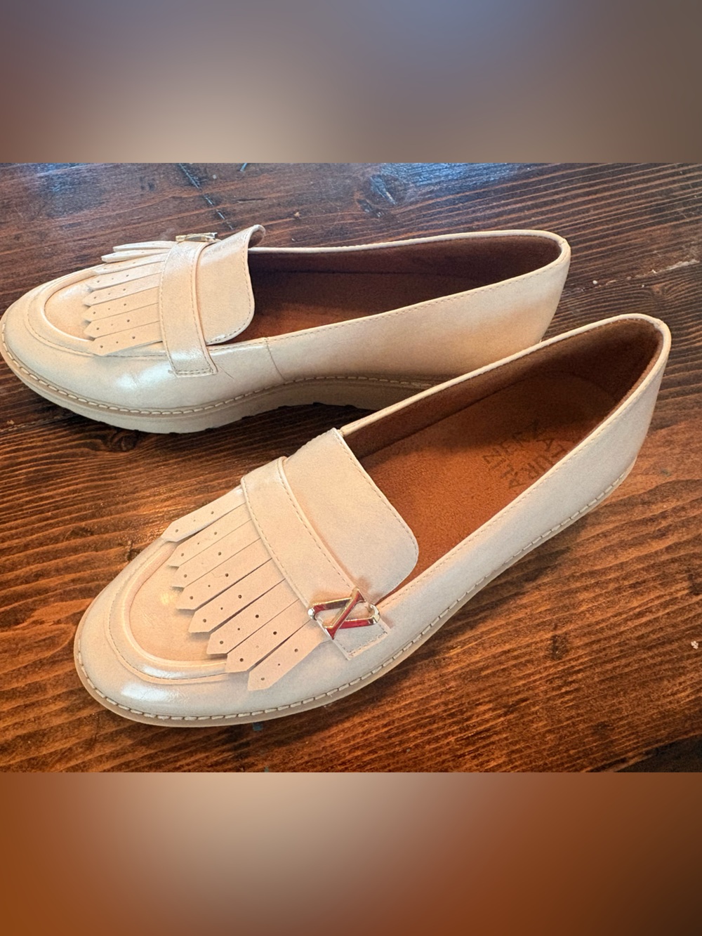 Naturalizer Women's Cream Kiltie Fringe Loafers with Gold Accent
